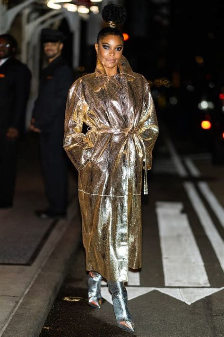 
Gabrielle Union Shines in a Gold Trench Coat and Silver Boots: ‘Ferrero Rocher Cosplay’ 